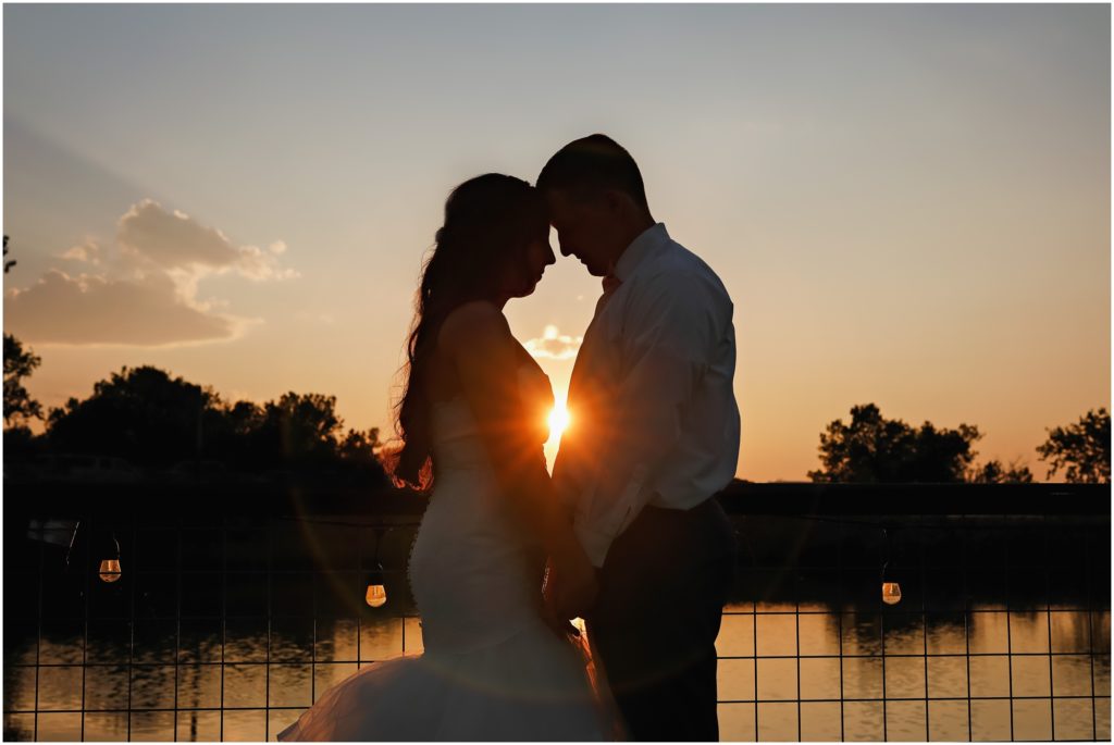 Dreamy Camelot Ranch Wedding Bride and Groom Sunset Silhouette