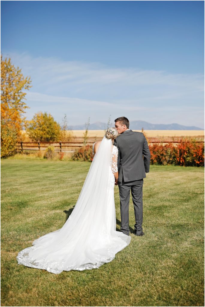 Rockin TJ Ranch Fall Wedding Bride and Groom Outdoor Looking at Mountains