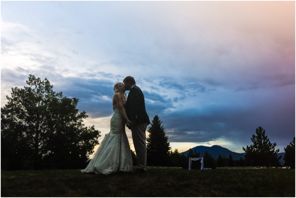 Red Lodge Mountain Golf Course Wedding Bride and Groom Sunset Kiss