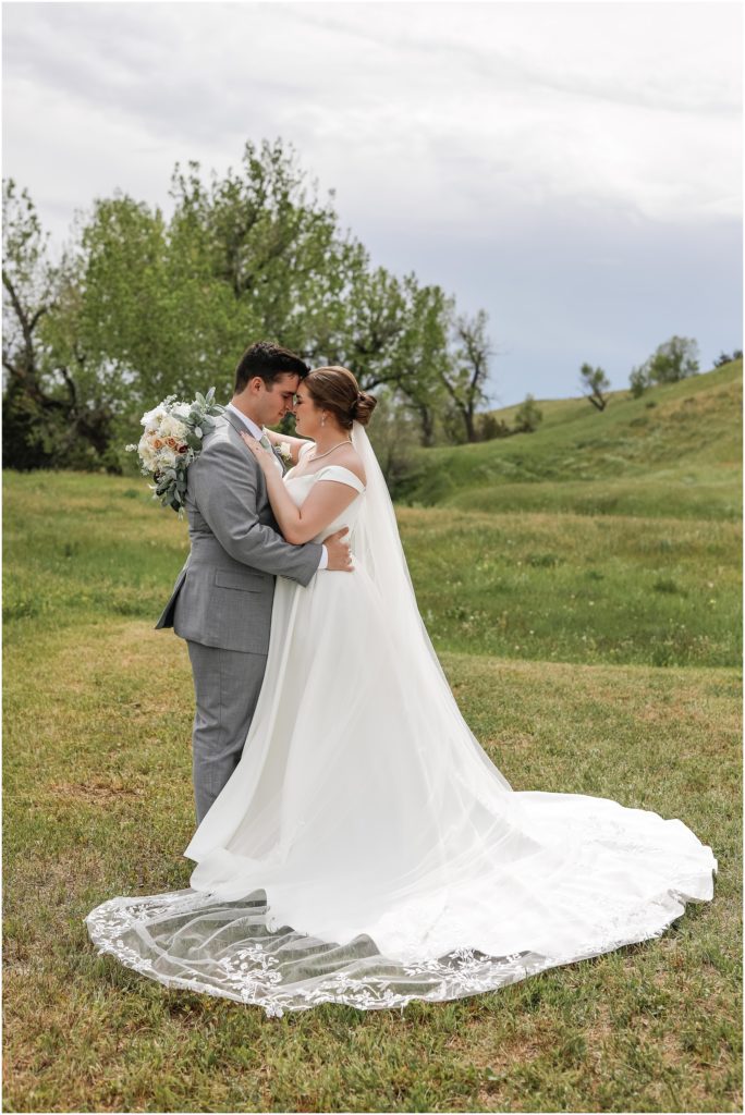 Rainy Spring Wedding in Billings MT Bride and Groom with foreheads touching