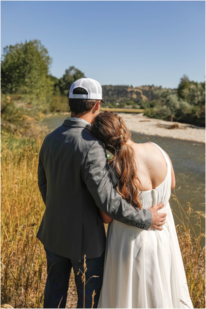 Joliet Wedding Bride and Groom looking at creek