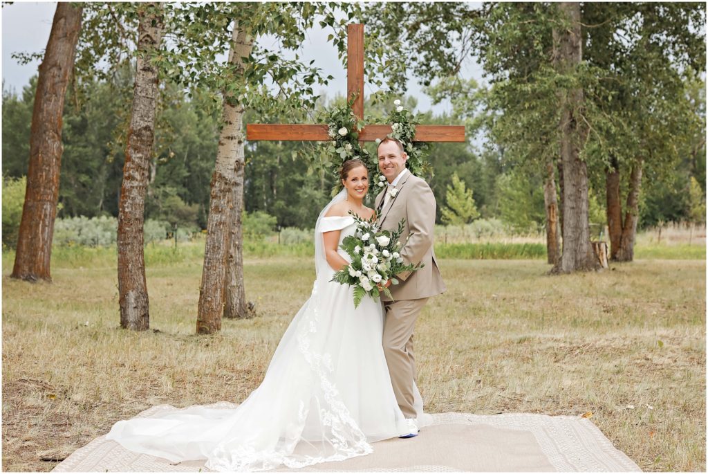 Missoula Wedding Bride and Groom in front of a wooden cross