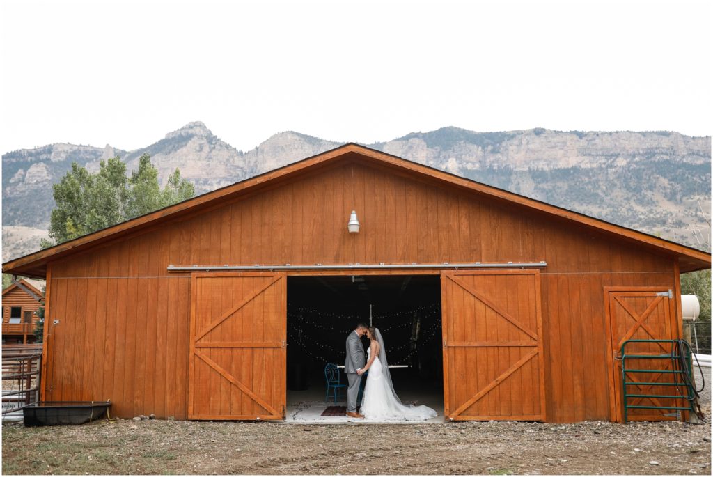 Wyoming Summer Wedding Bride and Groom in Barn
