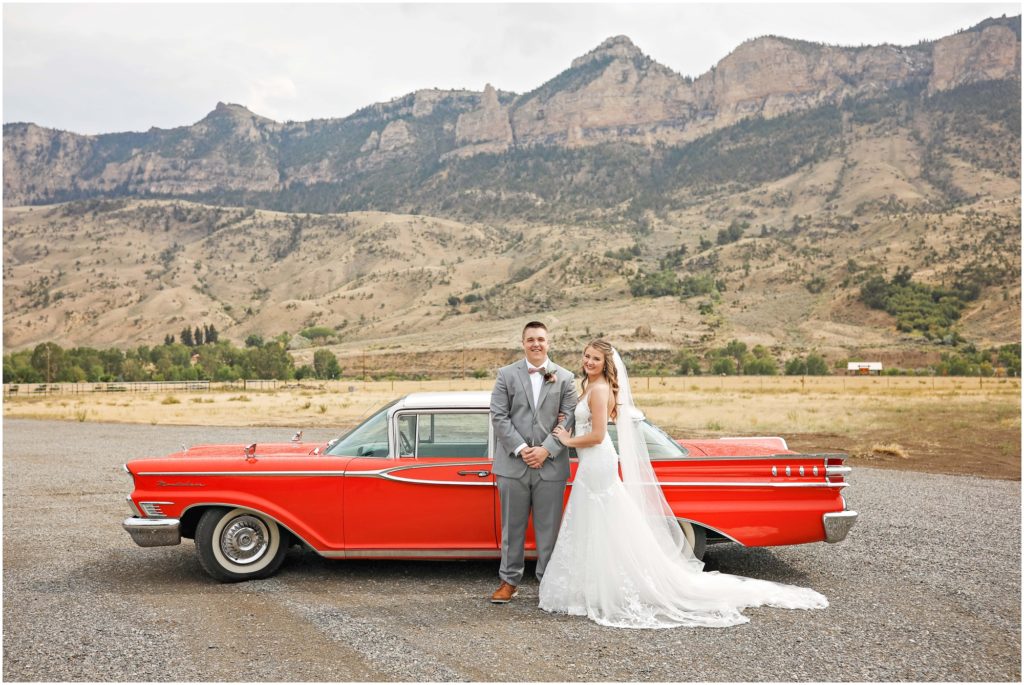 Wyoming Summer Wedding Bride and Groom with Red Mercury Montclair