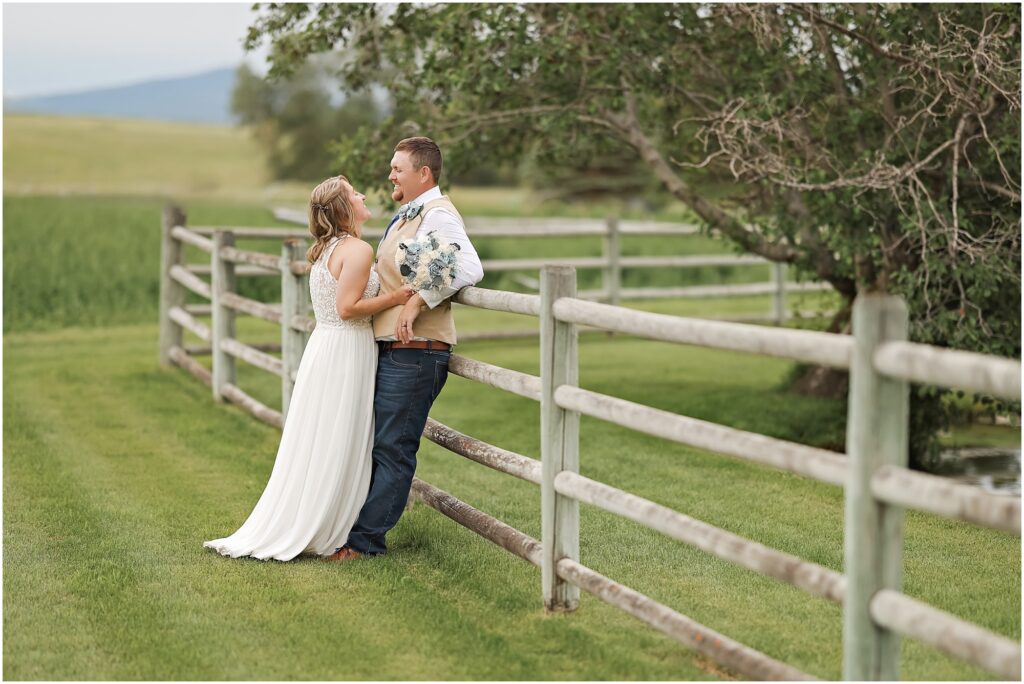 Intimate Bozeman Wedding - Bride & Groom Photos along a Fence